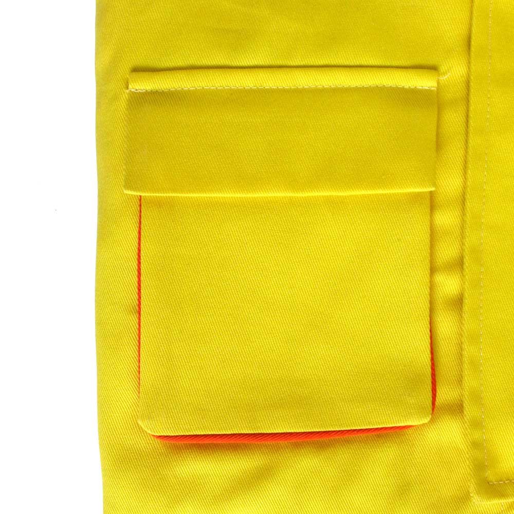 Details of the gusset pocket on a childrens yellow and orange lollipop person or school warden dress up costume